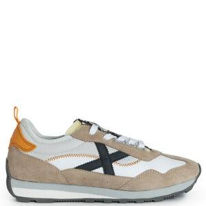 Zapatillas de la marca Munich modelo UM 61. Zapatillas deportivas elaboradas en combinación de nylon y ante. Suela de goma bicolor y cierre con cordones.