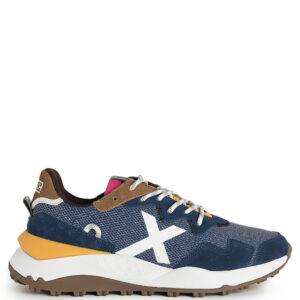 Zapatillas de la marca Munich modelo Shibuya 08. Zapatillas deportivas elaboradas en combinación de nylon y serraje. Cierre con cordones elásticos. Entresuela de EVA, piso de goma caucho e inserciones PU.