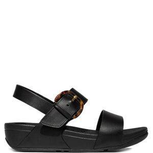 Sandalias de la marca Fit Flop modelo Lulu en color Negro. Sandalias de tiras elaboradas en cuero. Cierre ajustable con hebilla en carey y oro. Entresuelas ultracómodas Microwobbleboard. Suela de caucho antideslizante de 3 cm altura.